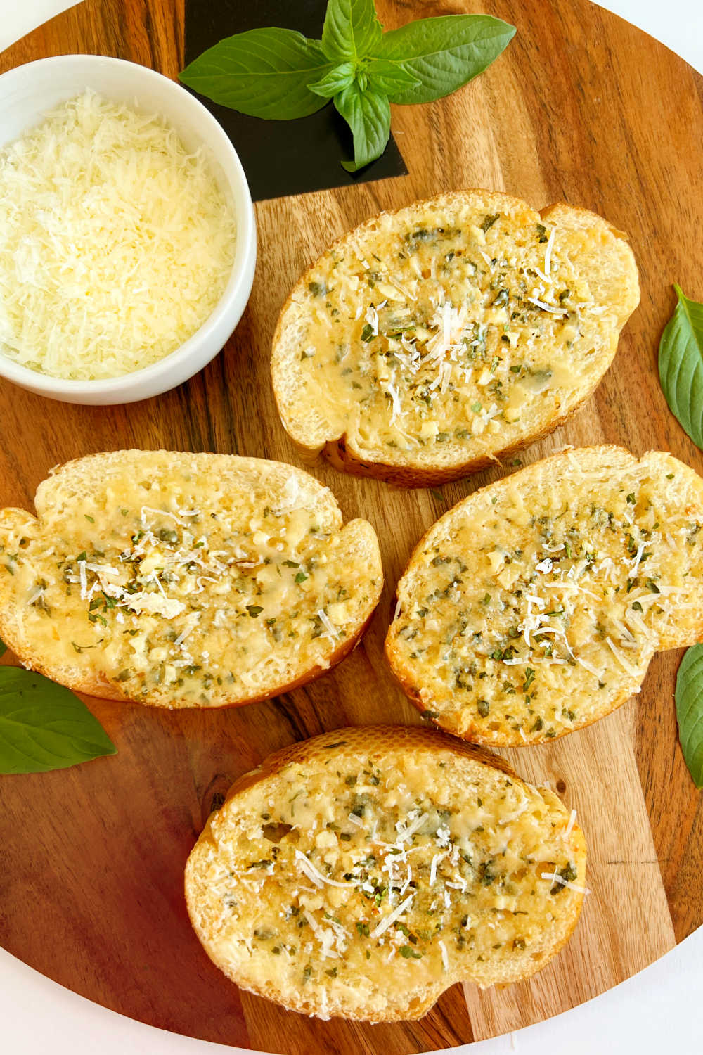 homemade garlic bread slices from french bread with Parmesan cheese