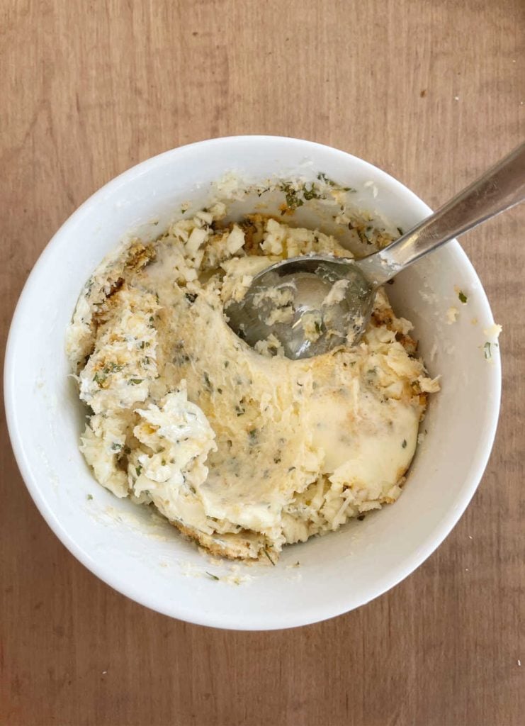 mix garlic butter spread with spoon