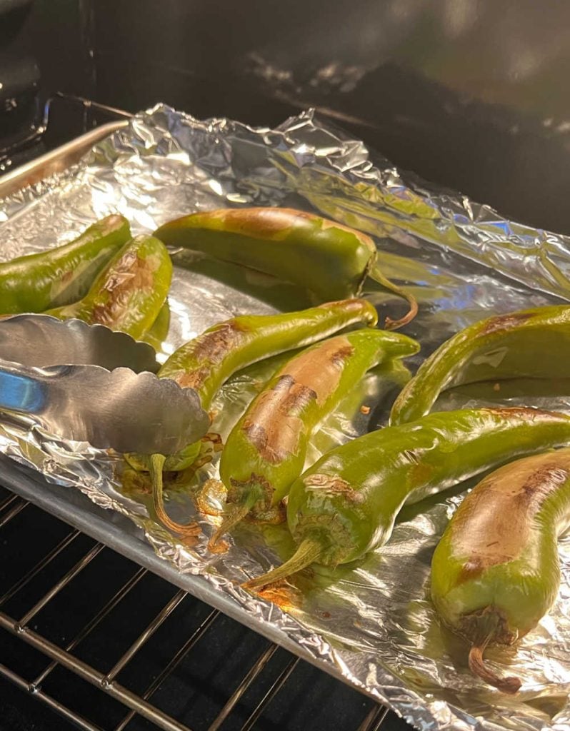 rotate hatch chiles in oven on baking sheet while roasting