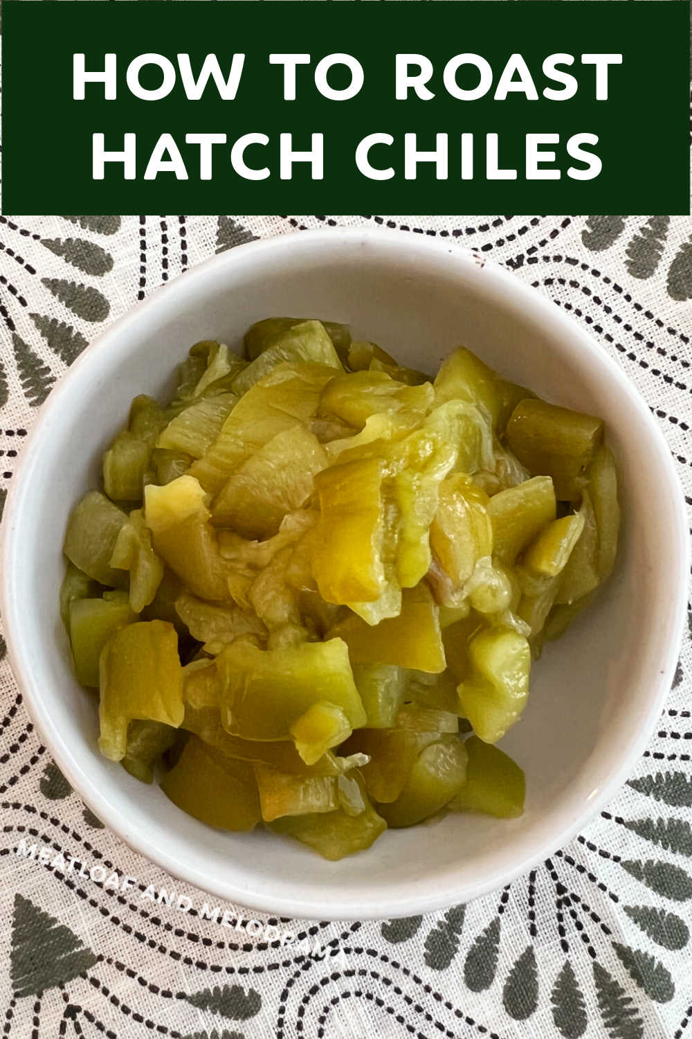 Learn how to roast hatch chiles in the oven and make your own diced roasted green chiles to use in your favorite recipes. Easy to freeze for later, so you can make the most of Hatch chile season! via @meamel