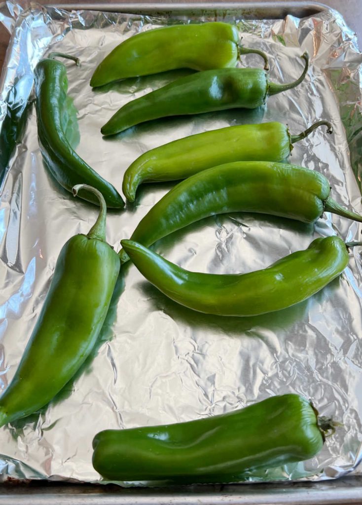 hatch chiles on a rimmed baking sheet