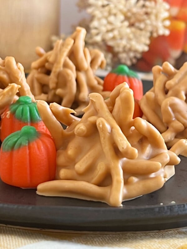 no bake haystack cookies with butterscotch and marshmallow pumpkins on plate