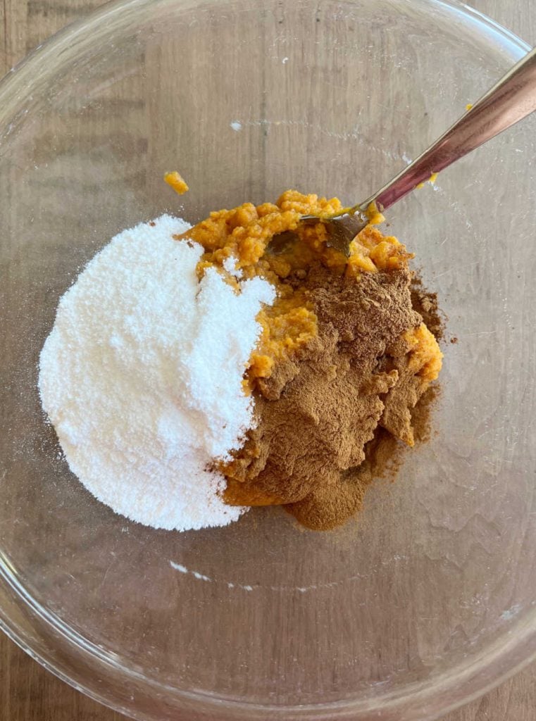 vanilla pudding mix, pumpkin puree and spices in mixing bowl