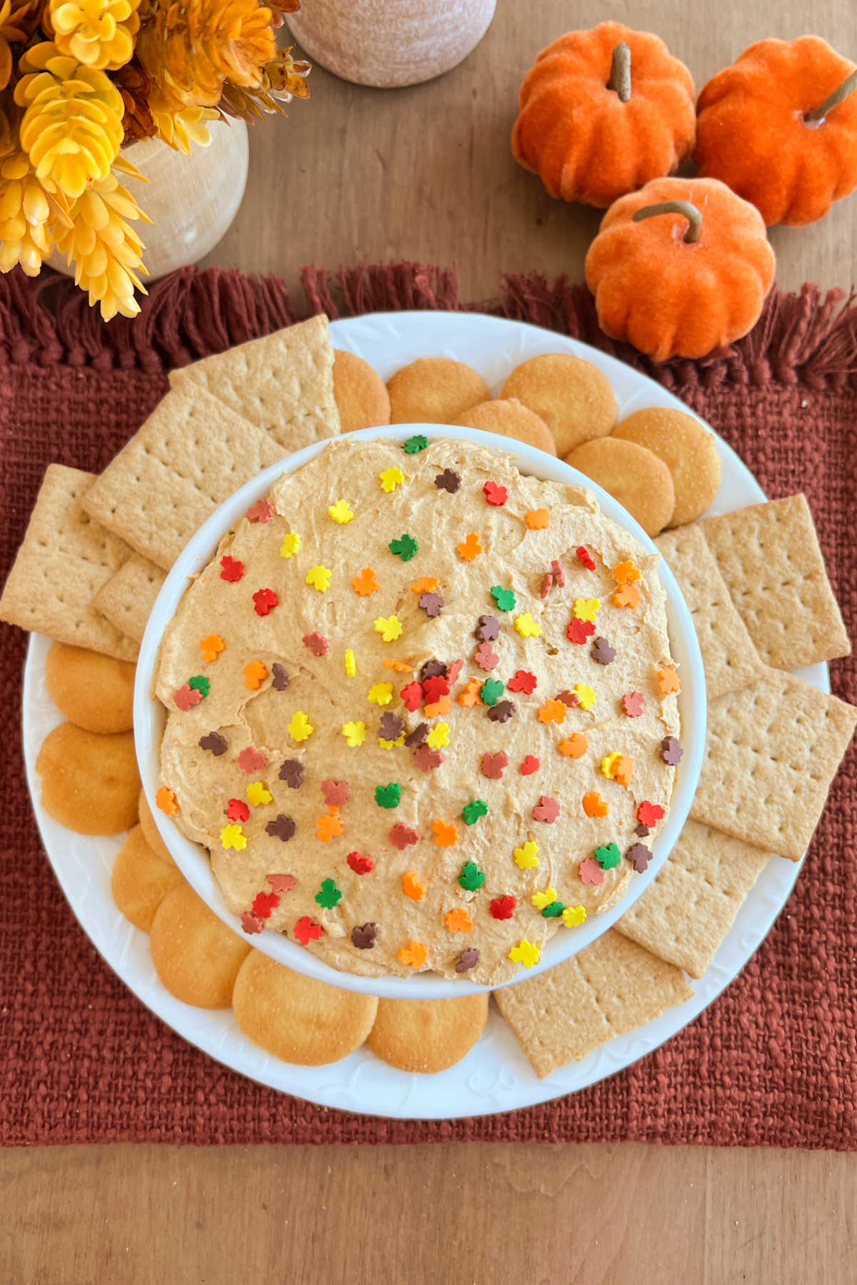 pumpkin pie dip with cool whip in a serving bowl