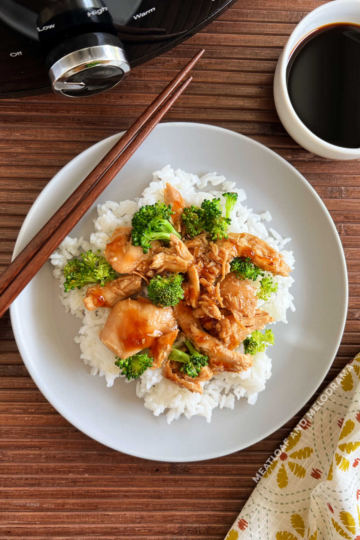 slow cooker teriyaki chicken with broccoli and bottled sauce over rice