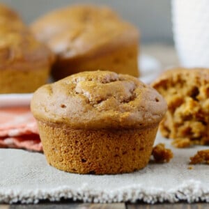 pumpkin muffins with applesauce on the table