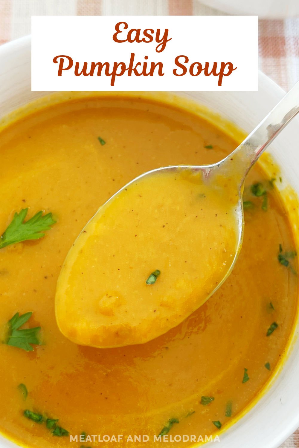 This Easy Savory Pumpkin Soup recipe with canned pumpkin puree and without cream is delicious, creamy and one of the easiest soups ever! This easy recipe makes the perfect soup for Thanksgiving dinner. via @meamel