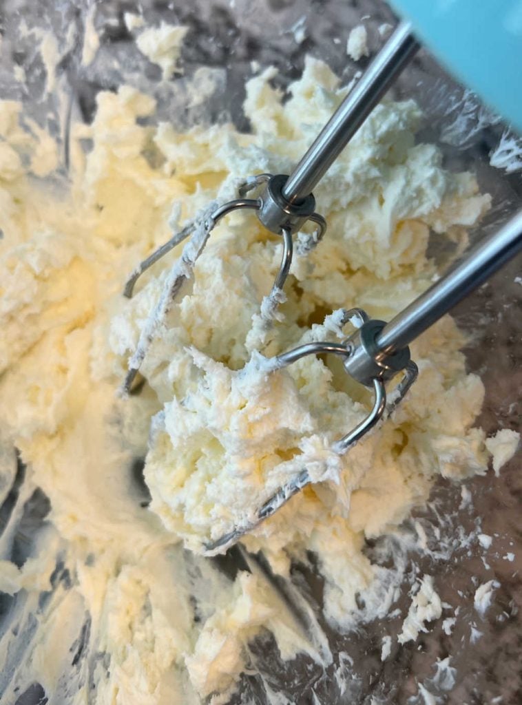 cream butter and sugar with electric mixer