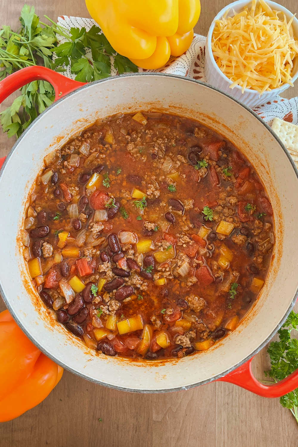 mild chili with ground beef in dutch oven on table