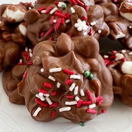 crockpot christmas candy peanut clusters with marshmallows and sprinkles