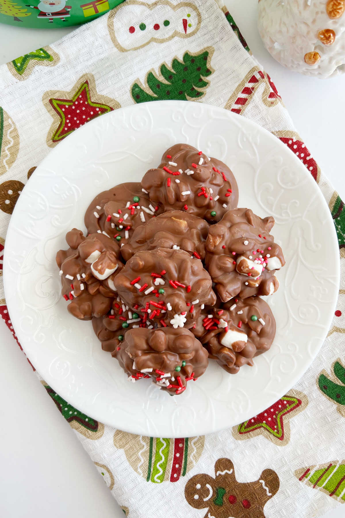 crockpot christmas candy with holiday sprinkles on plate