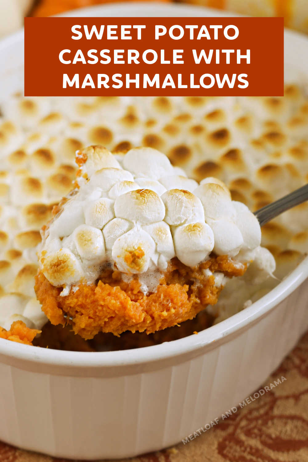 Sweet Potato Casserole with Marshmallows made with mashed sweet potatoes topped with gooey marshmallows is an easy Thanksgiving side dish.  Make ahead and reheat! A delicious addition to your Thanksgiving table or Christmas dinner! via @meamel