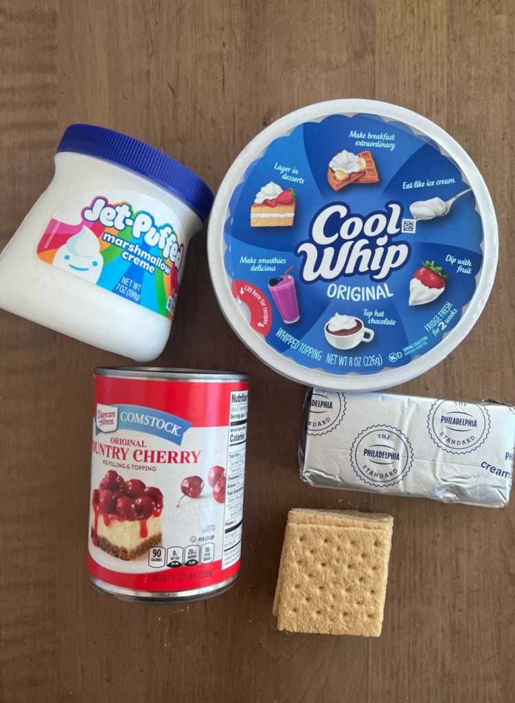 can of cherry pie filling, marshmallow creme, cool whip, cream cheese and graham crackers