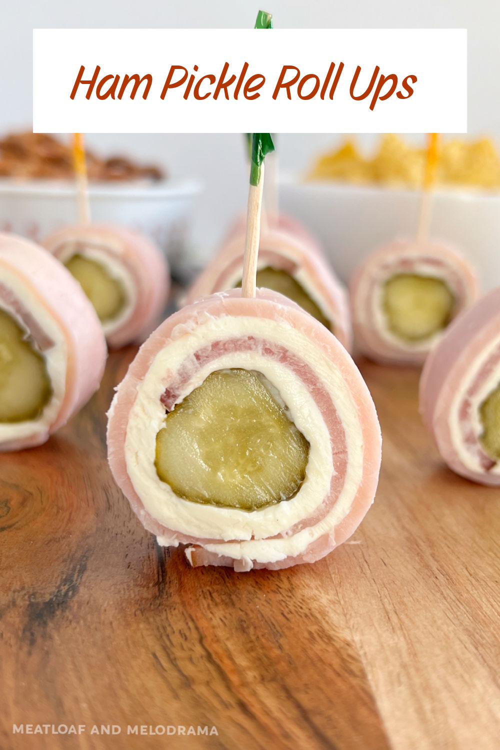 This Ham Pickle Roll Ups recipe is an easy appetizer made with deli ham slices spread with cream cheese, rolled around a pickle and sliced into rounds. These delicious ham rollups are sometimes known as Polish sushi! via @meamel