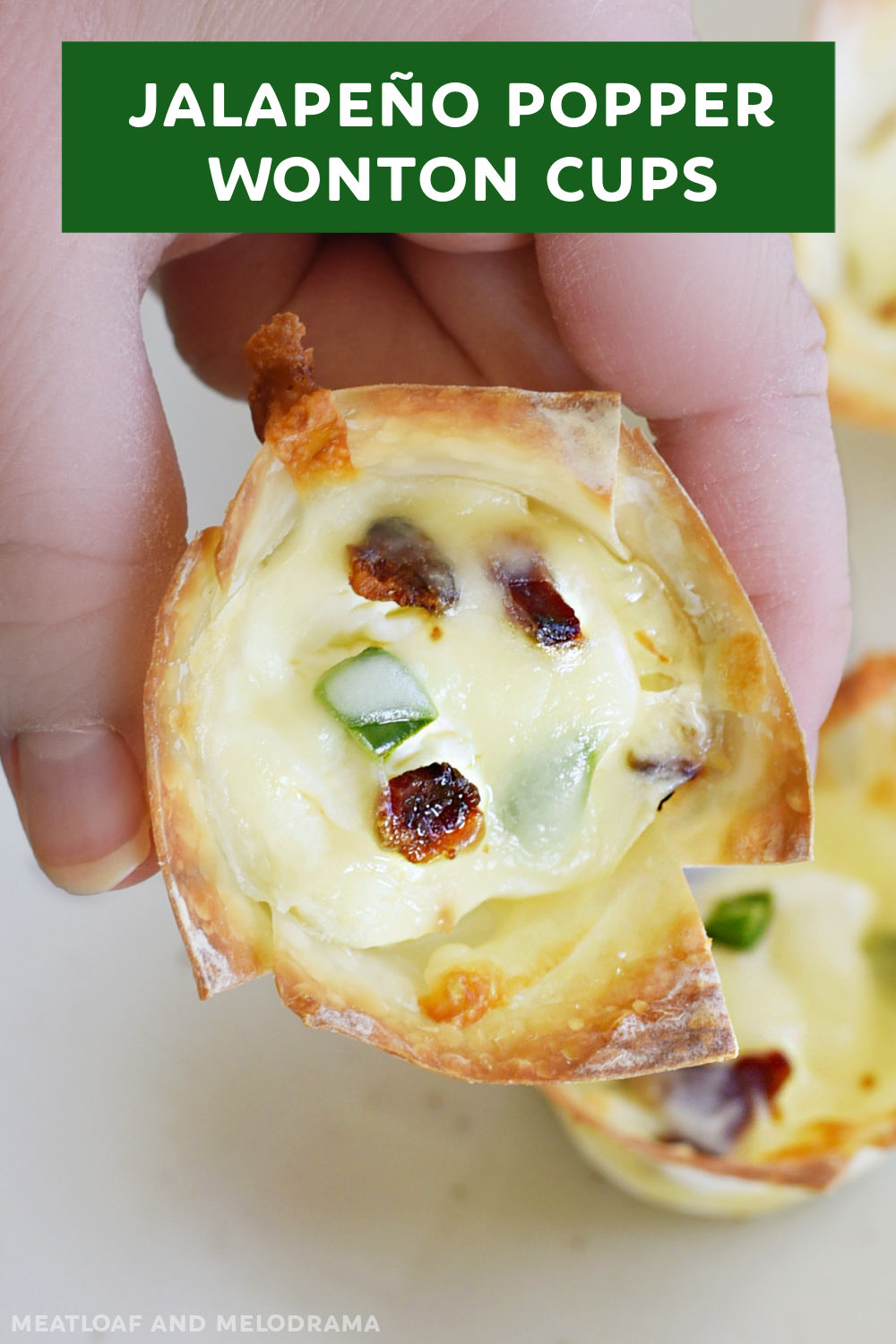 Jalapeno Popper Wonton Cups are baked wonton wrappers stuffed with cream cheese, mozzarella cheese and bacon. An easy appetizer recipe perfect for game day and holiday parties. via @meamel
