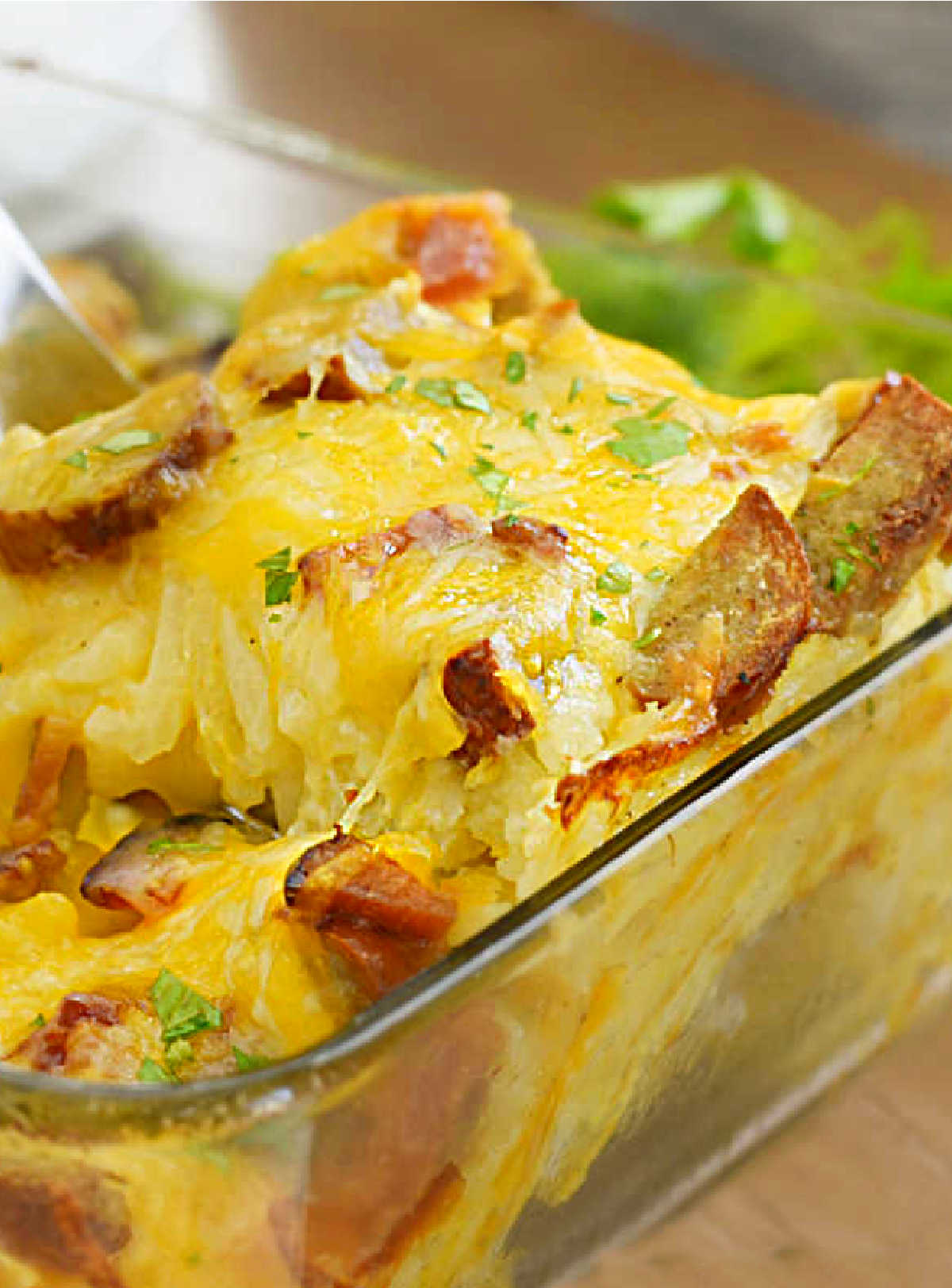 cheesy hashbrown breakfast casserole made with hash brown potatoes and breakfast sausage