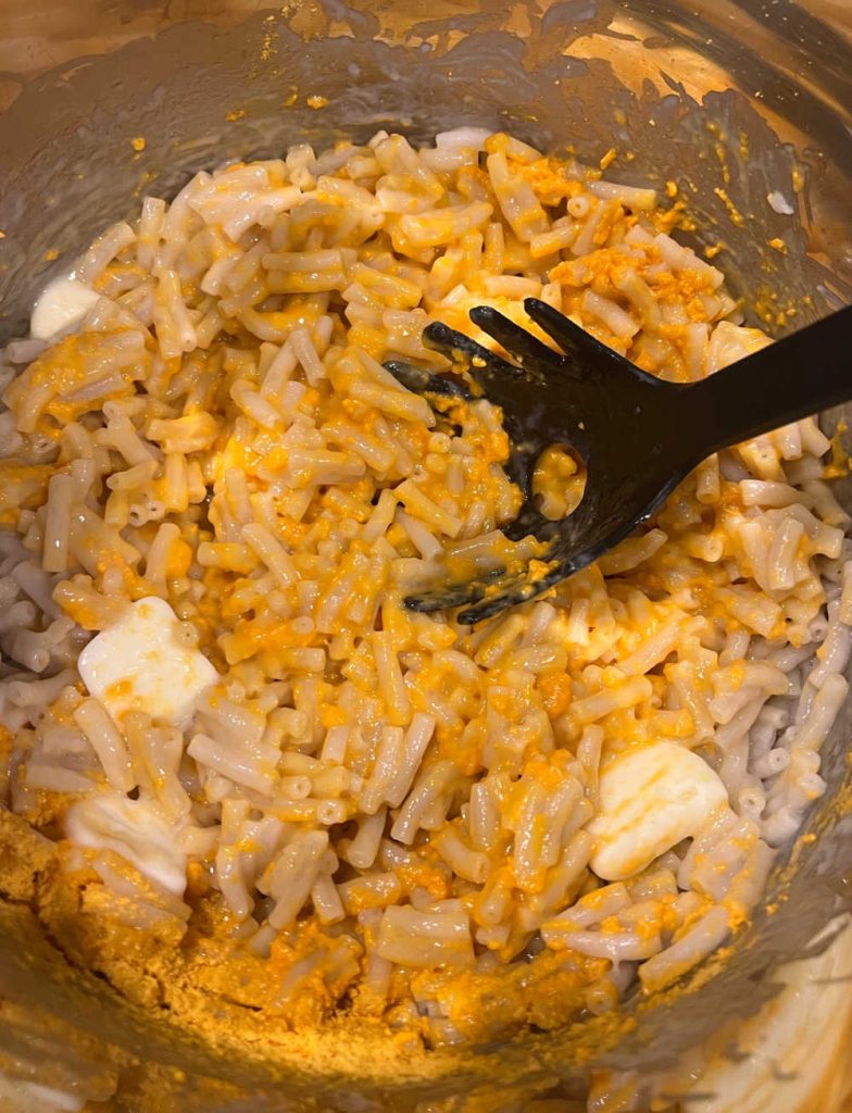 mix cheese packet with butter and macaroni in instant pot