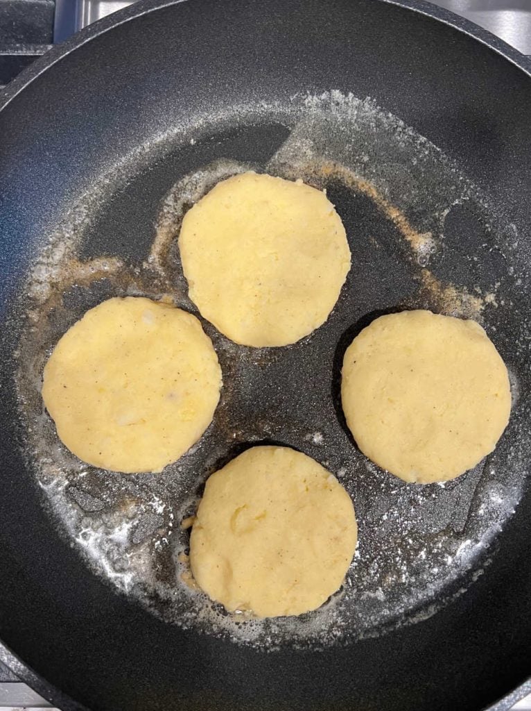 fry potato cakes in frying pan