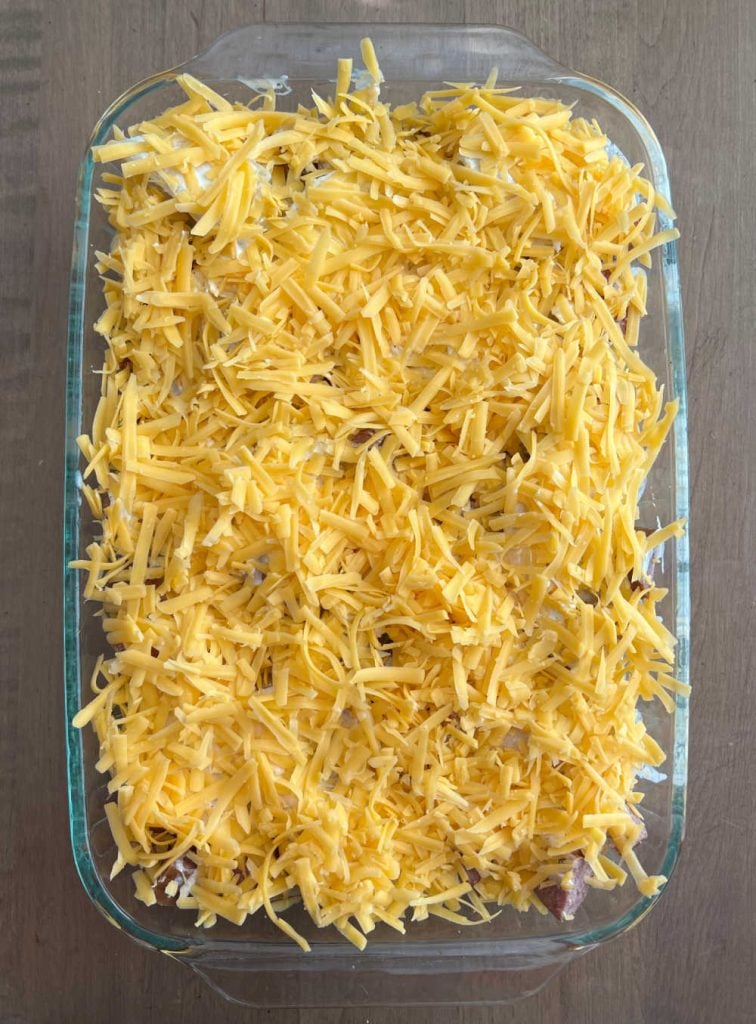 shredded cheddar cheese on casserole