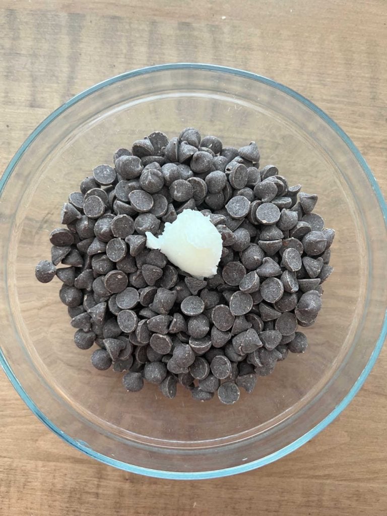 chocolate chips and coconut oil in microwave safe bowl