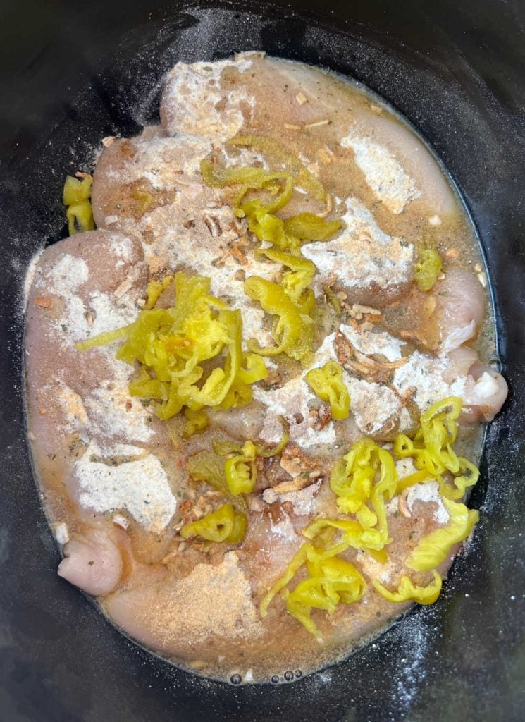 crock pot chicken with onion soup mix, ranch dressing mix and pepperoncini peppers
