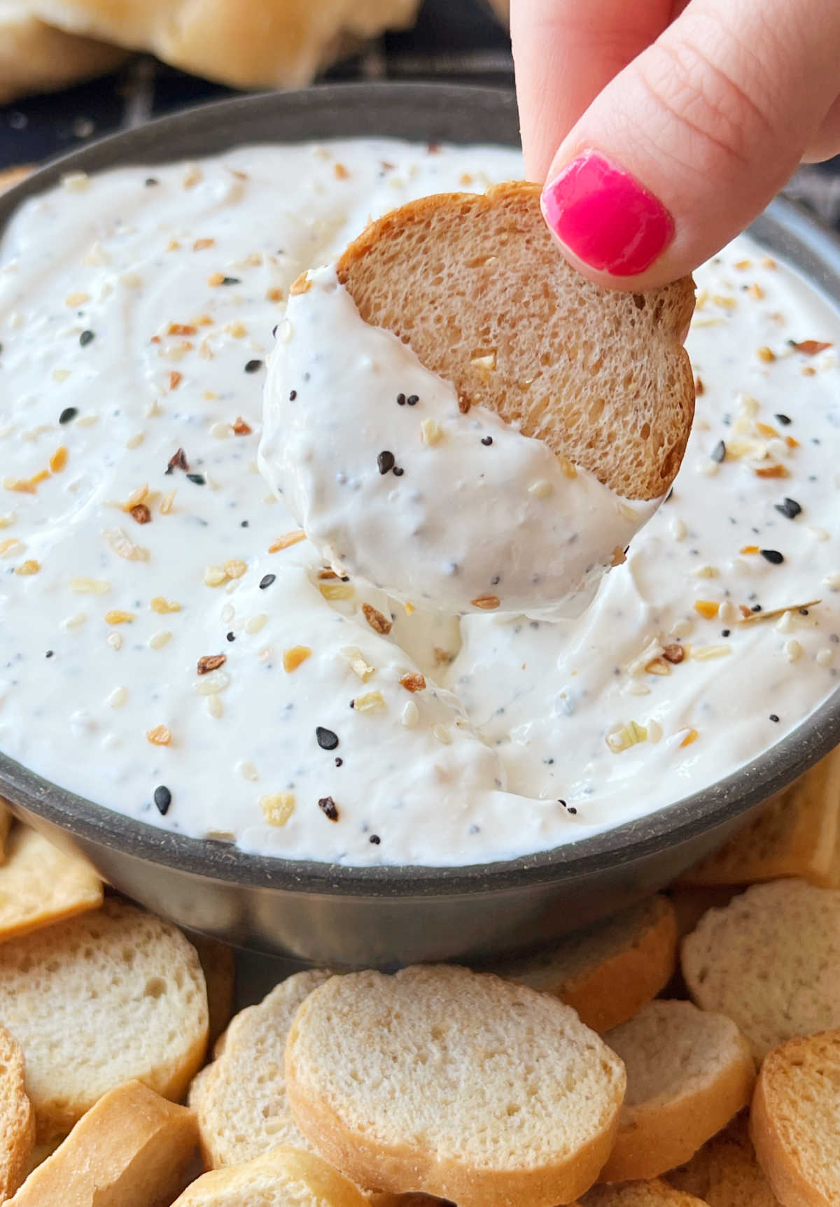 homemade everything bagel dip on a bagel chip