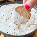everything bagel dip on a bagel chip