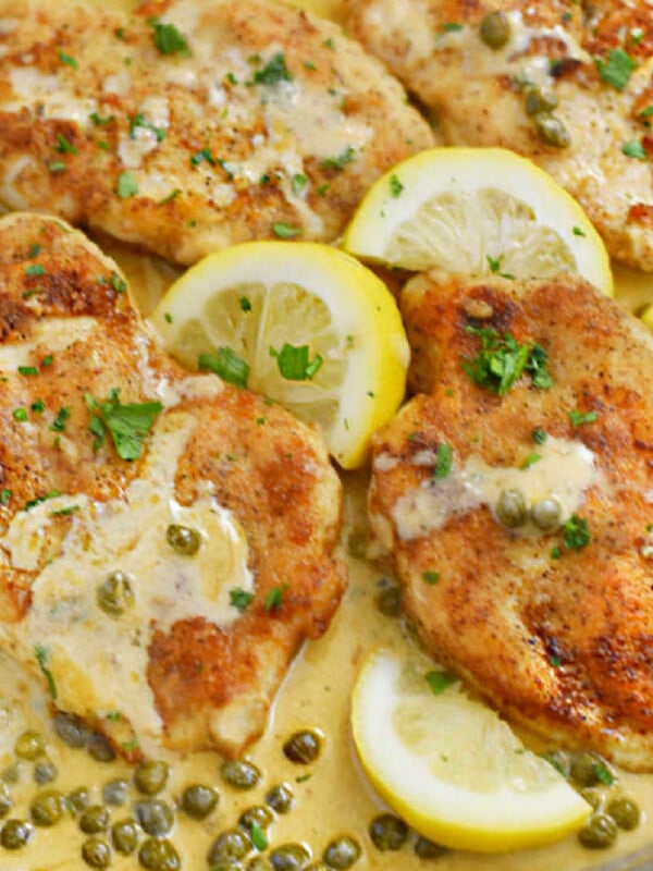 lemon chicken piccata in creamy lemon butter sauce with white wine and capers