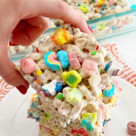 lucky charms marshmallow treats in hand