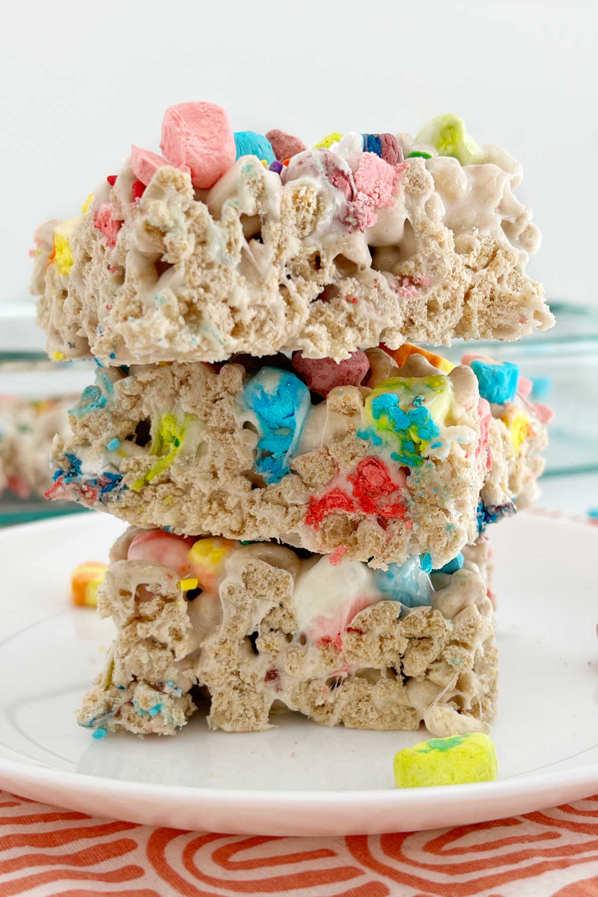 stack of lucky charms marshmallow treats on white plate