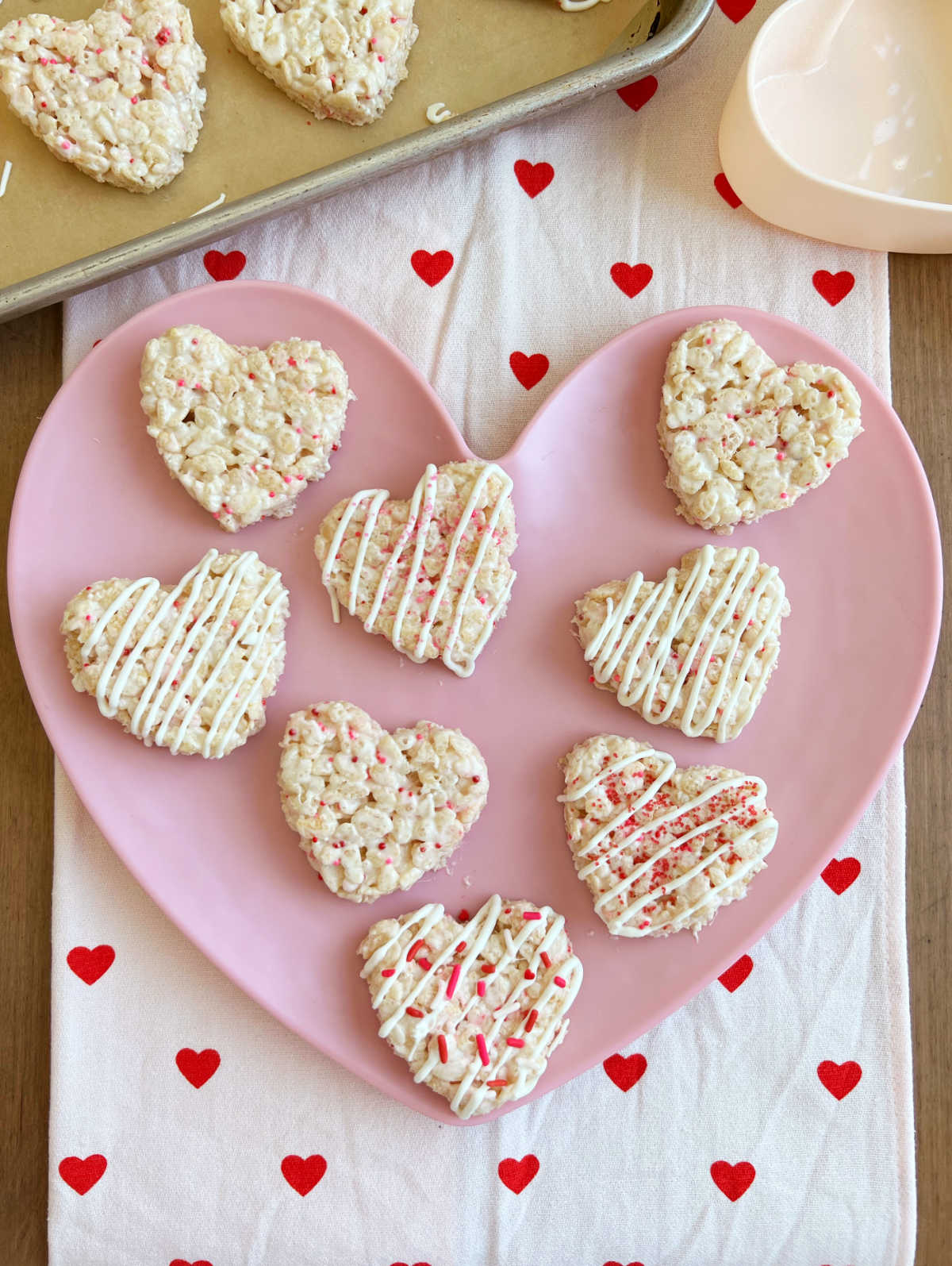 rice krispies heart cut outs on a pink heart plate