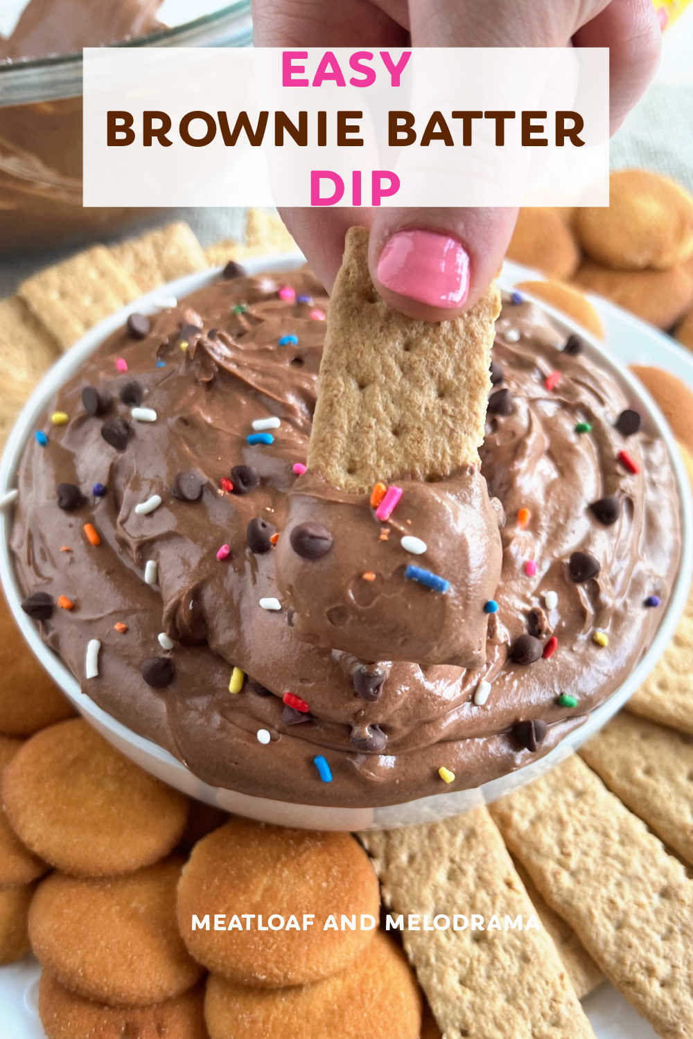 Brownie Batter Dip is an easy dessert dip that tastes like brownie batter. This no bake dessert recipe is rich, creamy and delicious! Enjoy this chocolate dip for holidays, birthday parties or baby showers! via @meamel