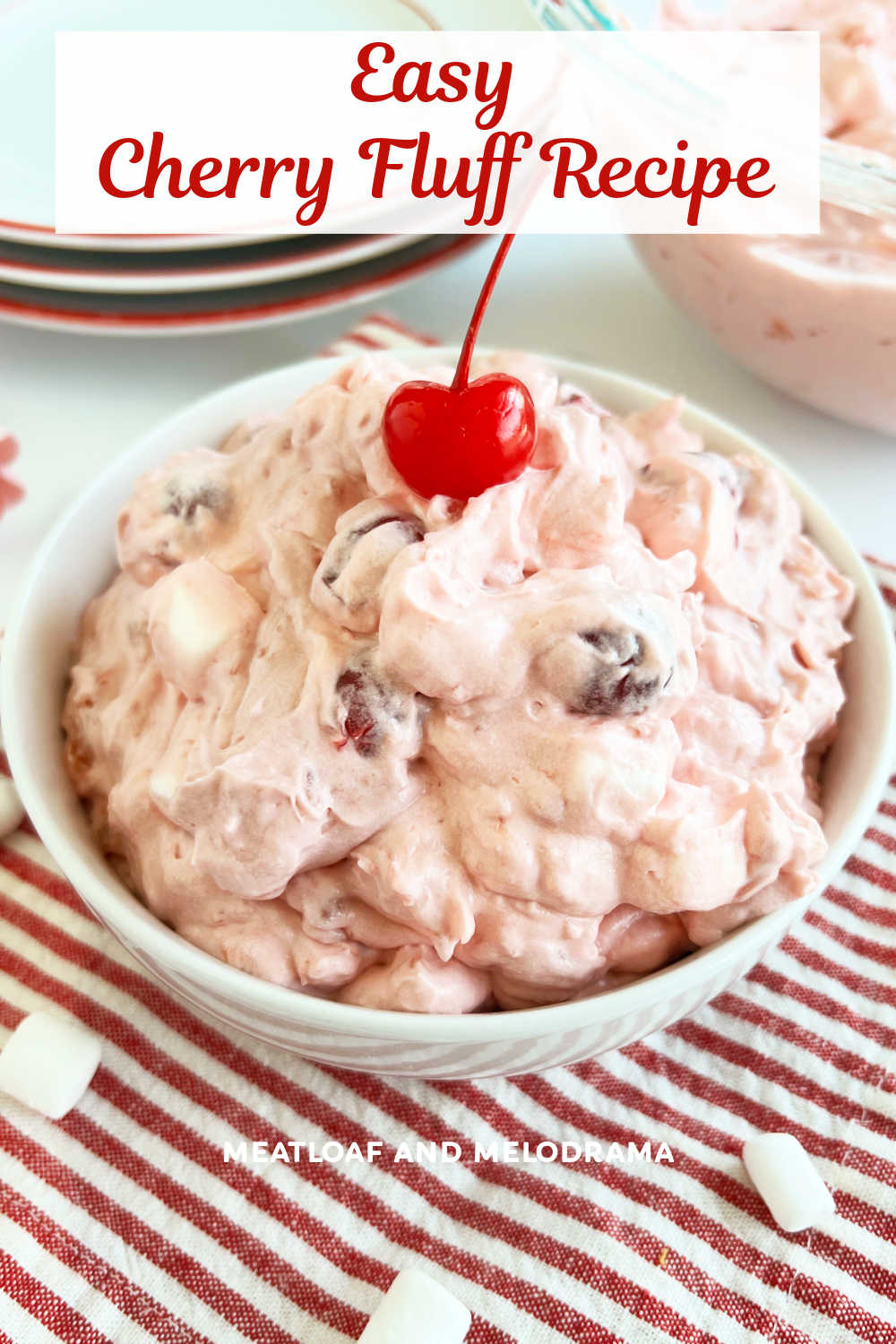 Cherry Fluff is an easy recipe for a classic dessert salad made with cherry pie filling, crushed pineapple, Cool Whip, mini marshmallows and vanilla pudding mix. This easy recipe makes a great side dish for family gatherings, potluck dinners or any special occasion! via @meamel