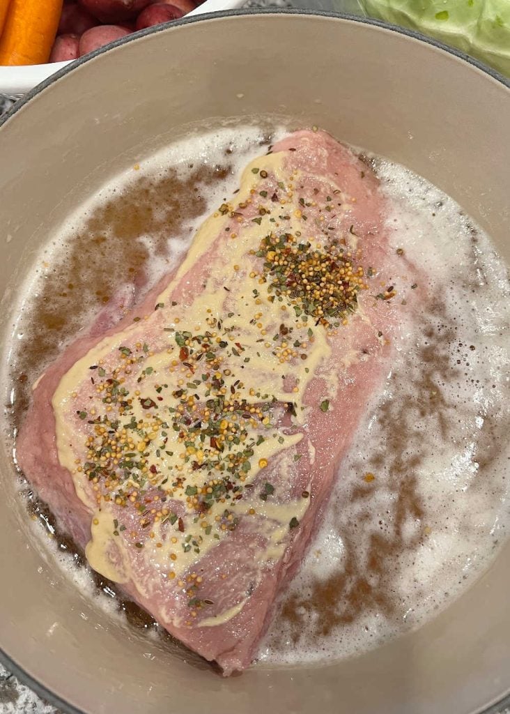 corned beef with dijon mustard and spice packet in beer