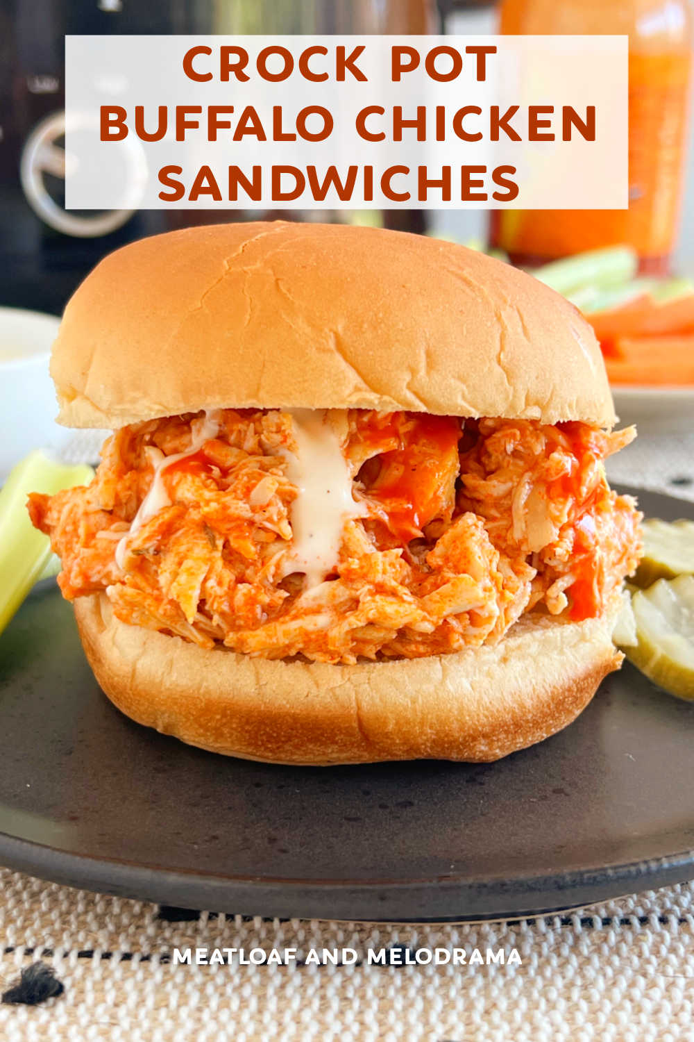 Crock Pot Buffalo Chicken Sandwiches is an easy slow cooker recipe with chicken, Buffalo sauce and ranch dressing mix. This easy chicken recipe is perfect for a quick dinner and a great recipe for game day! via @meamel