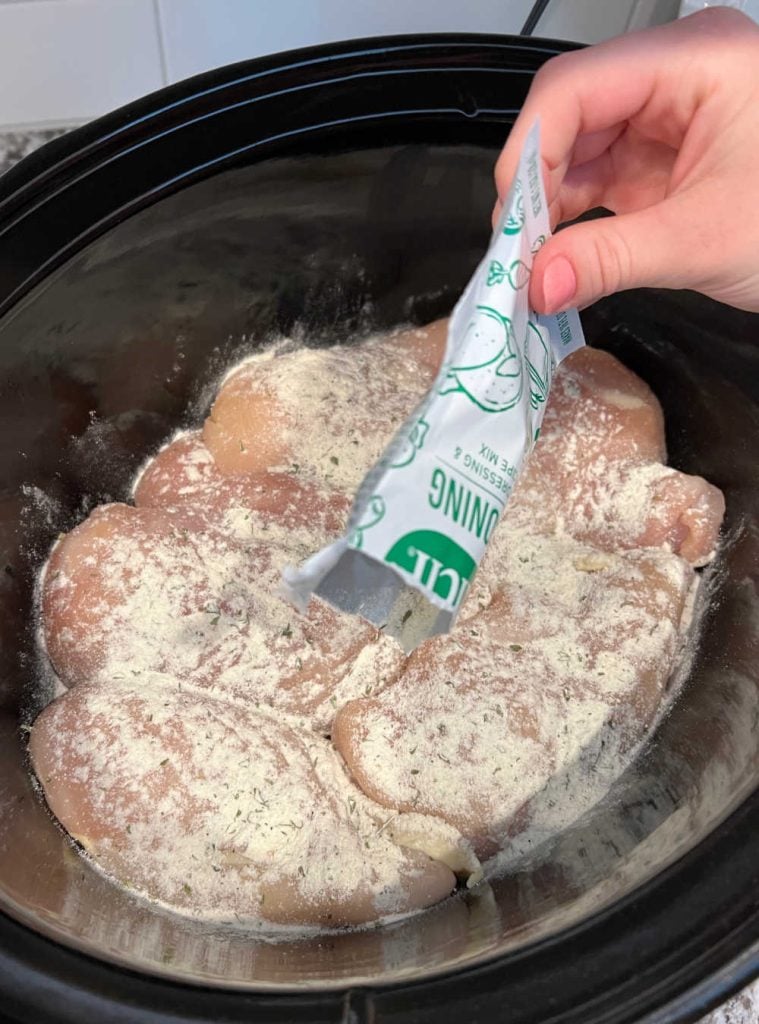 sprinkle dry ranch dressing mix over chicken in slow cooker