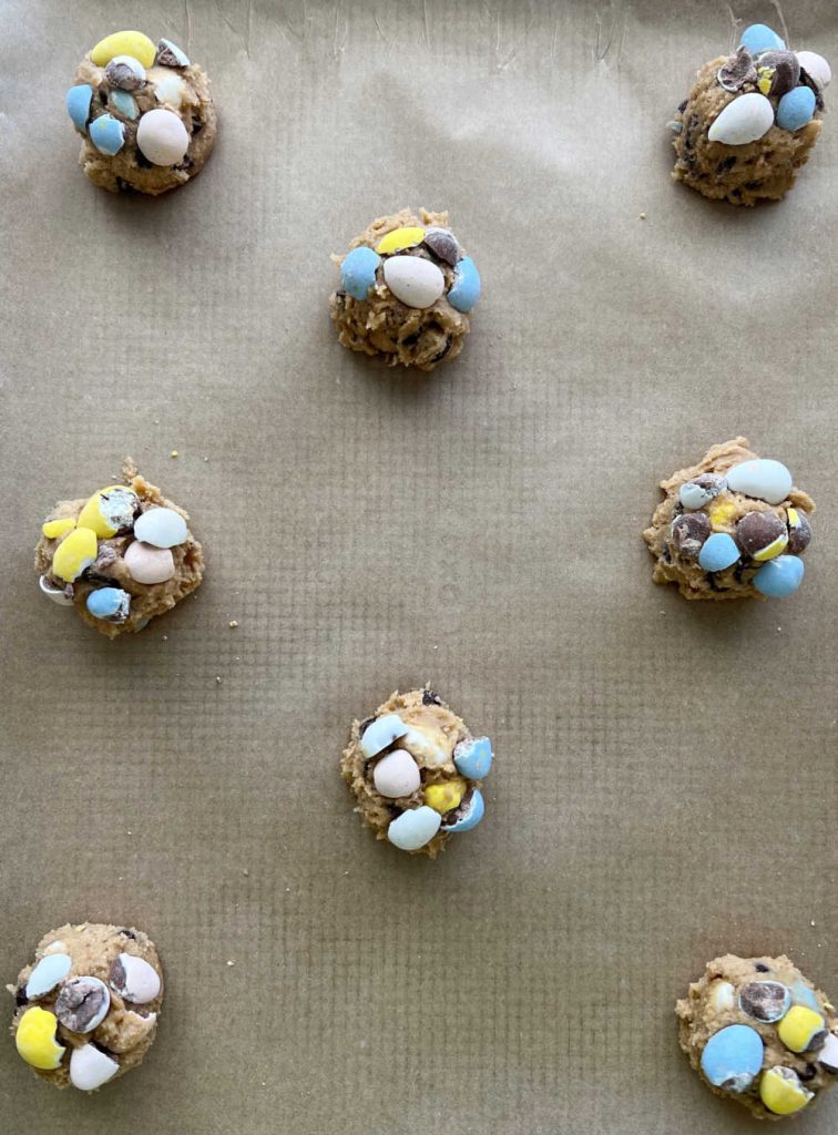 Easter cookie dough balls on baking sheet