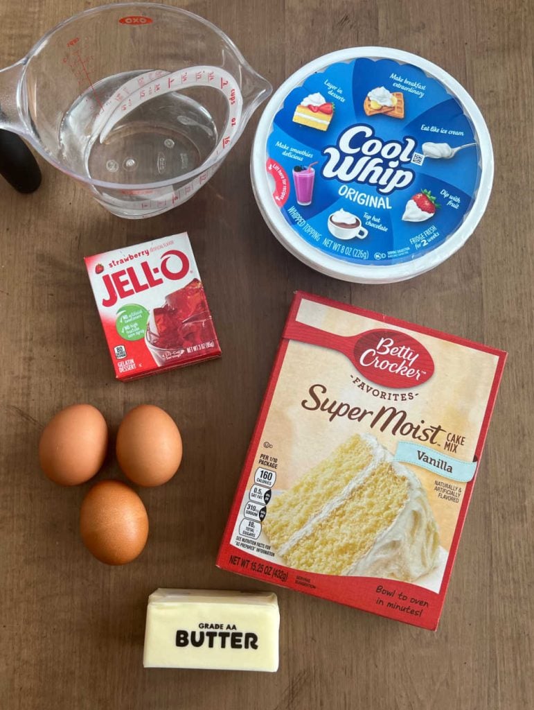 box of white cake mix, butter, eggs, strawberry jell-o, water and cool whip