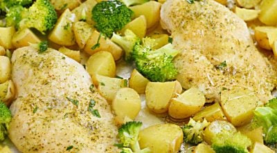 one pan ranch chicken and potatoes with broccoli on sheet pan