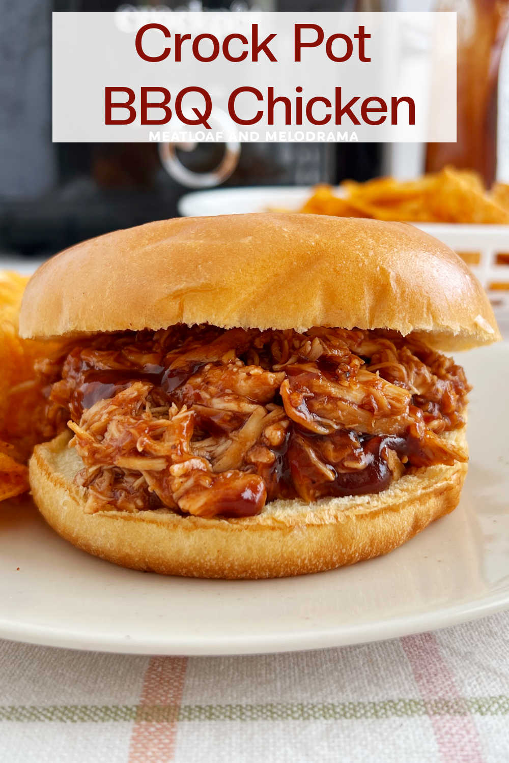 This Crockpot BBQ Chicken Recipe makes tender flavorful pulled chicken for the best barbecue chicken sandwiches. Everyone loves this easy recipe, and it is perfect for an easy weeknight dinner! via @meamel