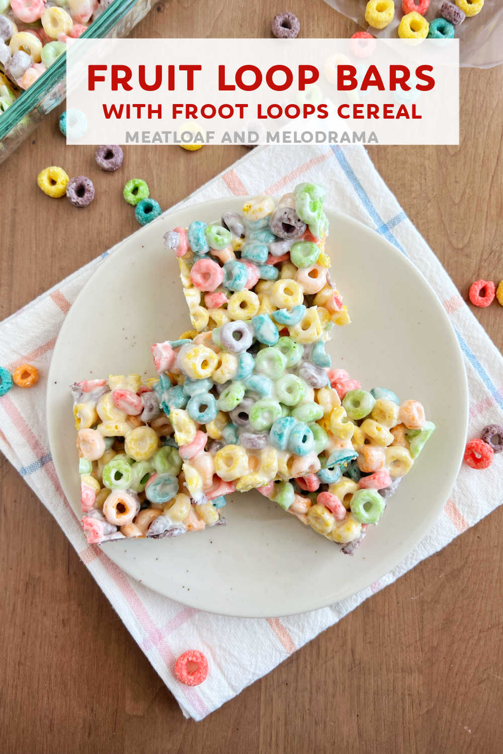 This Fruit Loop Bars Recipe makes easy no bake treats with colorful Froot Loops cereal and gooey marshmallows. Cereal treats are perfect for a quick dessert or after school snack! via @meamel
