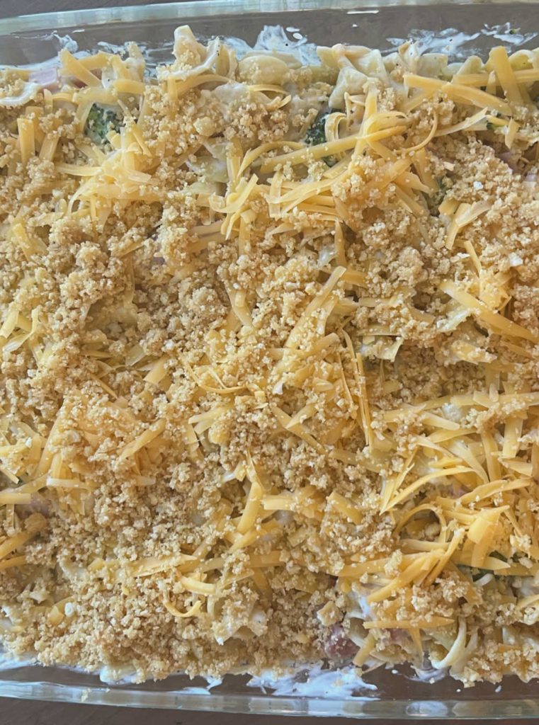 top casserole with butter and Ritz cracker crumbs