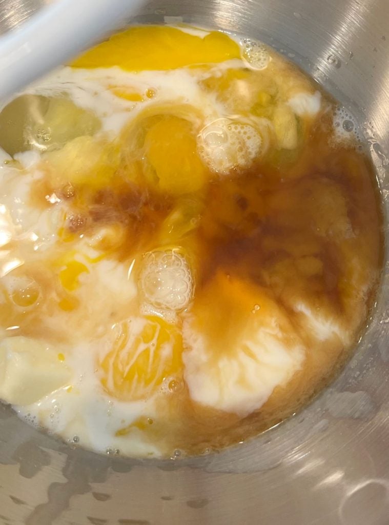 mix milk, butter and eggs in large bowl of stand mixer