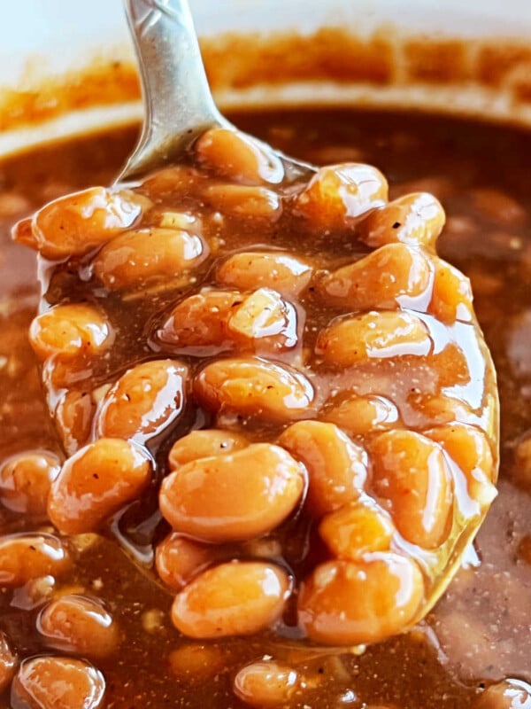 easy baked beans with brown sugar on a serving spoon