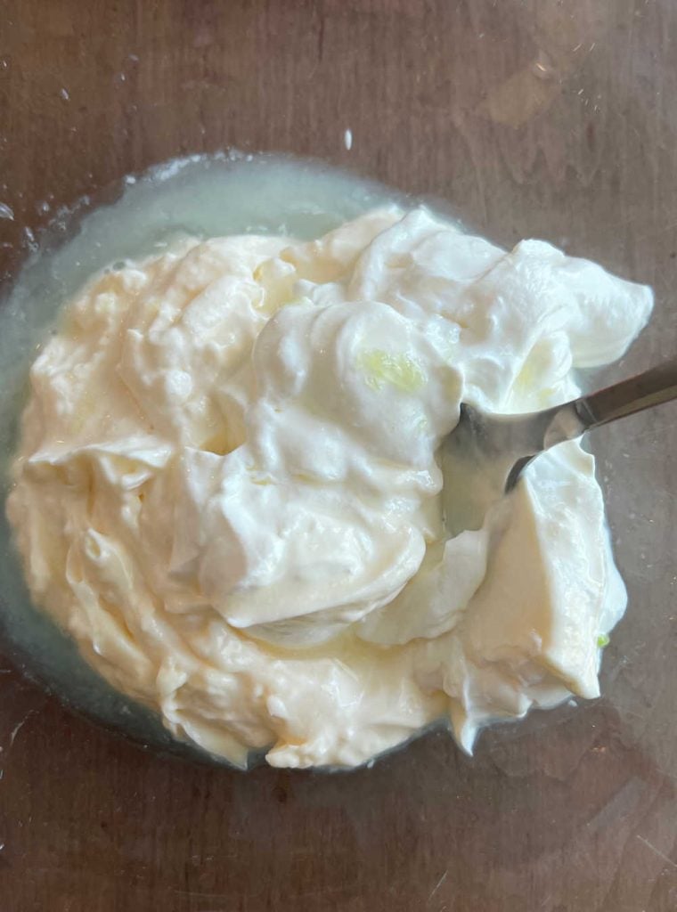 mix mayonnaise, sour cream and fresh lime juice in mixing bowl
