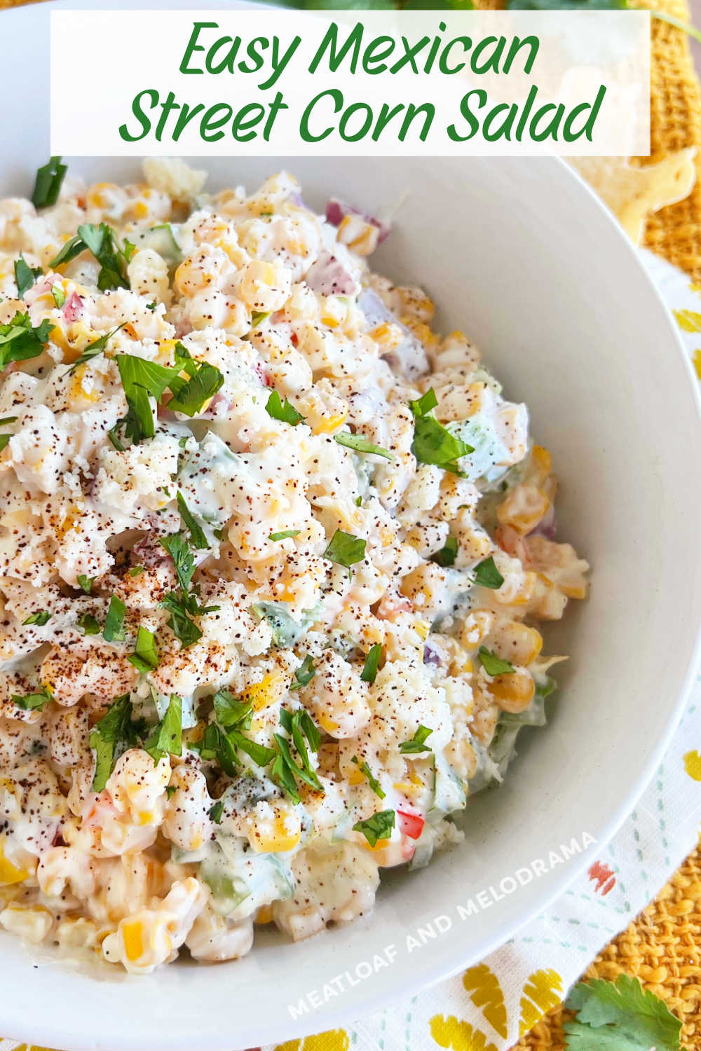 This Mexican Street Corn Salad recipe, sometimes called elote salad or esquites, is made with canned corn in a creamy dressing. This easy side dish is perfect for taco night or your next cookout. via @meamel