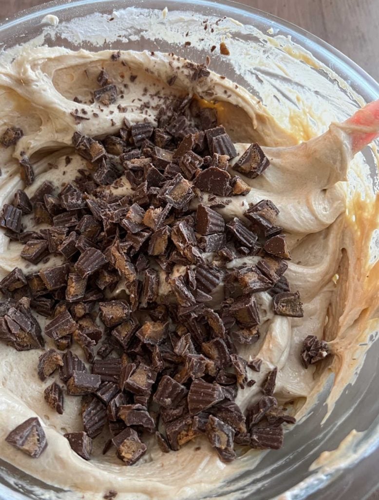mix mini Reese's cups into peanut butter mixture