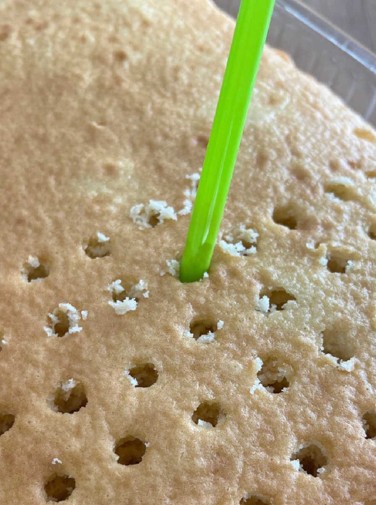 poke holes in baked cake with straw