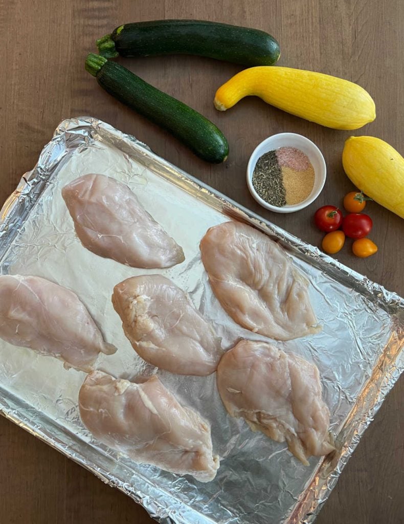 boneless skinless chicken breast, zucchini, yellow squash, seasonings and grape tomatoes