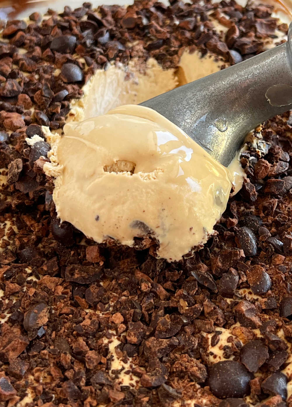 scoop homemade coffee ice cream with ice cream scoop